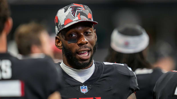 Aug 27, 2022; Atlanta, Georgia, USA; Atlanta Falcons tight end Kyle Pitts (8) shown on the bench during the game against the Jacksonville Jaguars during the second half at Mercedes-Benz Stadium.